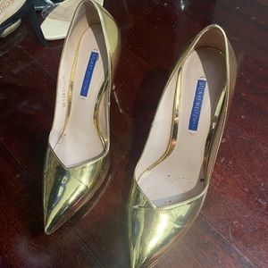Stuart Weitzman gold pumps